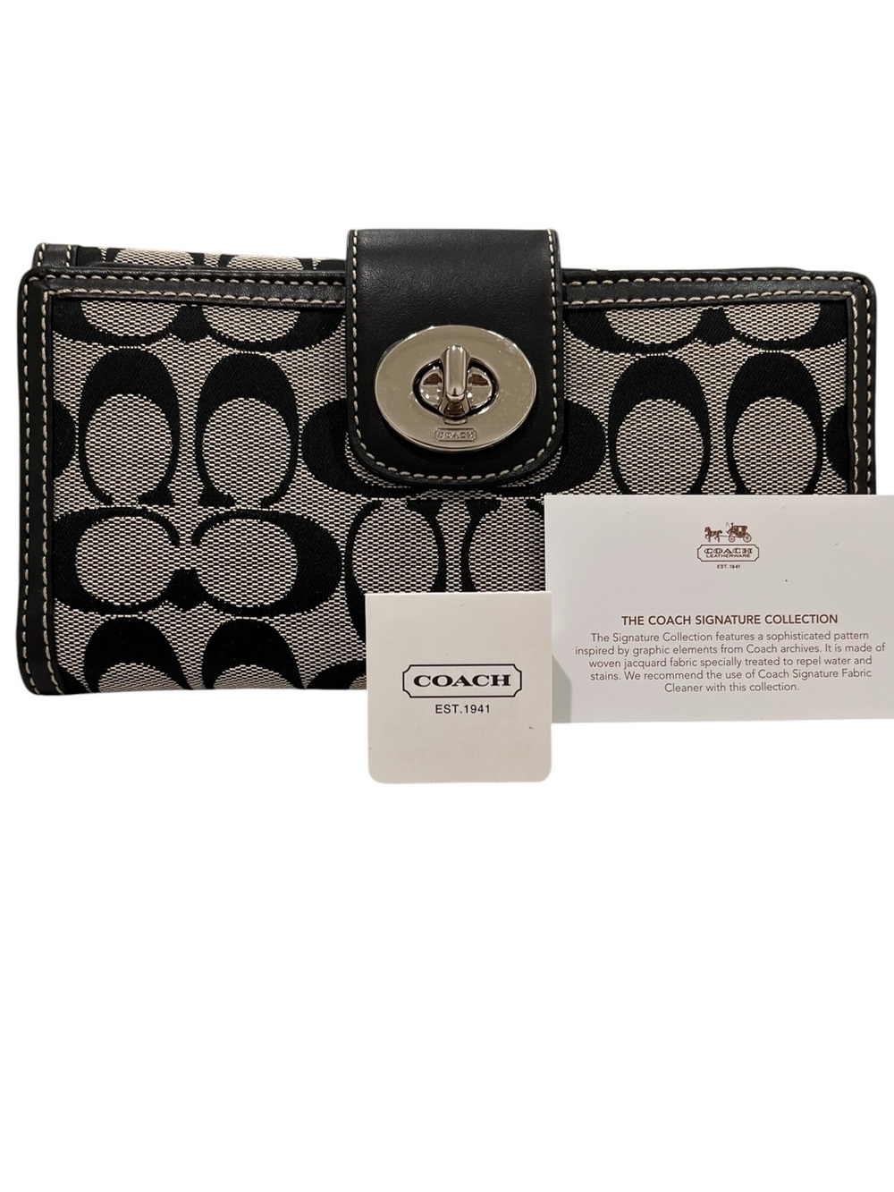 Coach Signature Black and Cream Turnlock Wallet